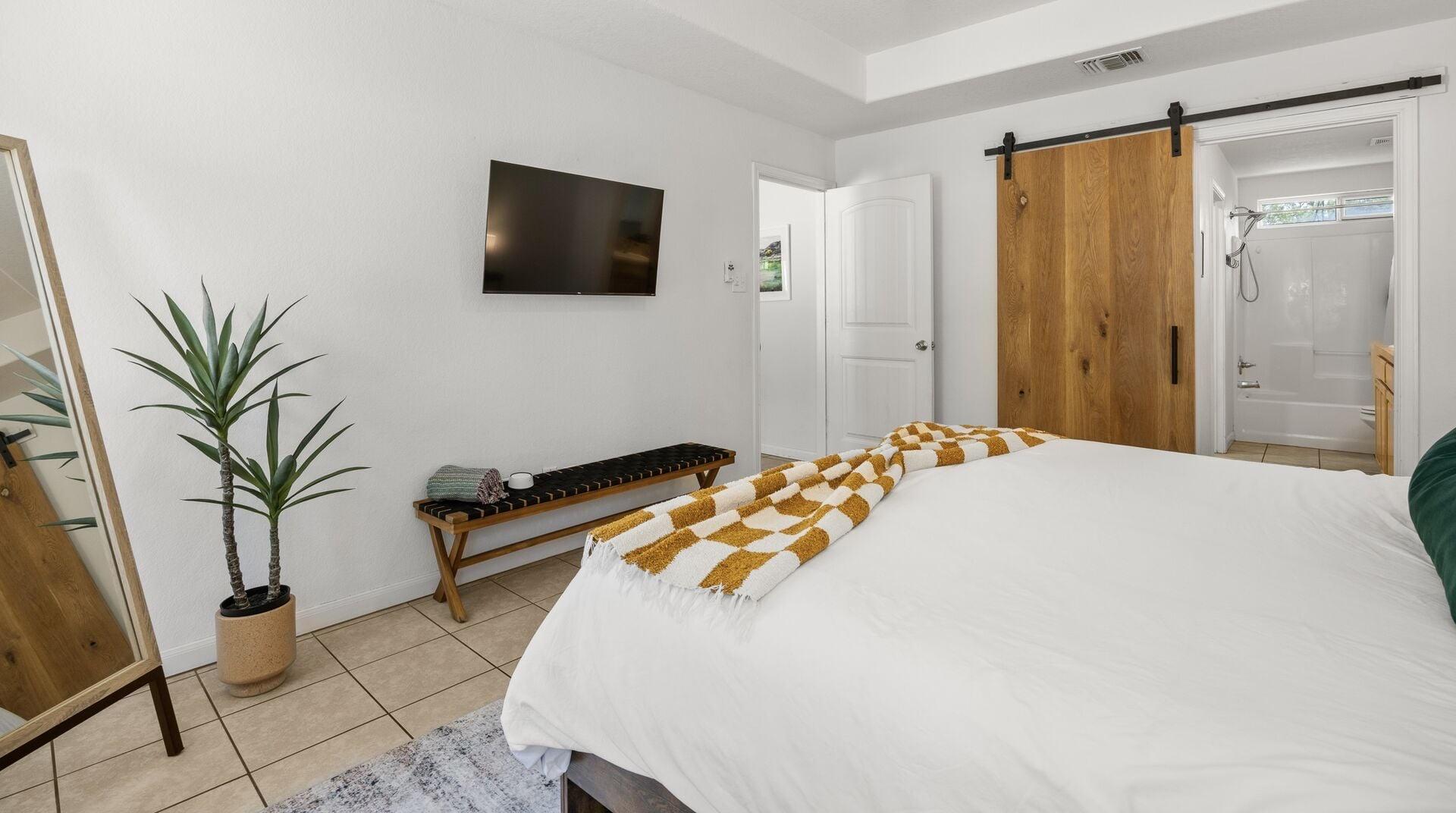 Bedroom with sliding barn door